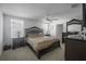 Main bedroom featuring lots of natural light, carpet, and a ceiling fan at 5189 Greenheart Ave, Mount Dora, FL 32757