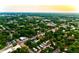 Aerial view of homes surrounded by lush greenery at 808 S Clara Ave, Deland, FL 32720