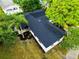 An aerial view of a beautifully updated home with lush landscaping at 808 S Clara Ave, Deland, FL 32720