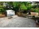 View of the backyard, shed, and car port on a paver patio at 808 S Clara Ave, Deland, FL 32720