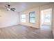 Bright room with light flooring, large windows and modern ceiling fan at 808 S Clara Ave, Deland, FL 32720