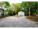 Backyard view of the shed on a paved patio at 808 S Clara Ave, Deland, FL 32720