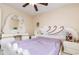Comfortable bedroom featuring a ceiling fan, providing a serene atmosphere for relaxation at 1309 Timberbend Cir, Orlando, FL 32824
