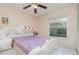 Bright bedroom with a ceiling fan, natural light, and an inviting atmosphere for restful nights at 1309 Timberbend Cir, Orlando, FL 32824
