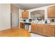 Functional kitchen offering plenty of cabinet space, efficient appliances, and a convenient breakfast bar at 1309 Timberbend Cir, Orlando, FL 32824
