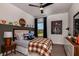 This delightful bedroom offers comfort and character, with whimsical accents and outdoor views at 17020 Cercis Loop, Clermont, FL 34711