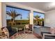 Relaxing patio with comfortable seating offers a serene outdoor space and scenic views at 17020 Cercis Loop, Clermont, FL 34711