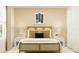 Light bedroom featuring pendant lamps on light end tables, and minimal décor at 2180 Albatross Nest Dr, Bartow, FL 33830