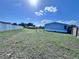 This large backyard features partial fencing at 4300 Meadow Ridge Ave, Mulberry, FL 33860