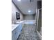 A great bathroom includes double sinks, a large tub, a walk-in shower, and lots of space at 4300 Meadow Ridge Ave, Mulberry, FL 33860