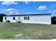 Charming single-story home featuring a small entry porch and large front yard at 4300 Meadow Ridge Ave, Mulberry, FL 33860