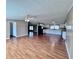Spacious open floor plan with lots of room and new vinyl floors connecting the living room, dining area and kitchen at 4300 Meadow Ridge Ave, Mulberry, FL 33860