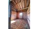 Empty wood paneled stall with sand floor and natural lighting at 6726 Nw 54Th Loop, Ocala, FL 34482