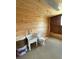 Unfinished bathroom featuring sink, toilet, wood paneling, and concrete floor at 6726 Nw 54Th Loop, Ocala, FL 34482