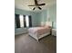 Comfortable bedroom with natural light and ceiling fan at 6726 Nw 54Th Loop, Ocala, FL 34482