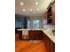 Gourmet kitchen features a spacious island and stainless steel appliances at 6726 Nw 54Th Loop, Ocala, FL 34482