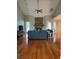 Open concept living room and hardwood floors create warmth in the space at 6726 Nw 54Th Loop, Ocala, FL 34482