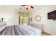 Bedroom with comfortable bed and coordinated decor at 7654 Comrow St # 202, Kissimmee, FL 34747