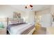 Bedroom with comfortable bed and coordinated decor at 7654 Comrow St # 202, Kissimmee, FL 34747