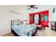 Themed bedroom with bed, decor, and plenty of space at 7654 Comrow St # 202, Kissimmee, FL 34747