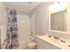 Clean, well-lit bathroom featuring a shower, vanity, and contemporary fixtures at 24 Lake Vista Way, Ormond Beach, FL 32174