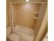 Clean bathroom with a shower-tub combo and neutral finishes at 2414 Willow Oak Dr, Edgewater, FL 32141
