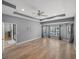 Large primary bedroom boasting tile floors, tray ceilings, and great natural light at 3939 Sunset Lake Dr, Lakeland, FL 33810