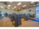Well-equipped community gym with treadmills, weight machines, and mirrored walls for fitness at 3939 Sunset Lake Dr, Lakeland, FL 33810