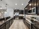 Updated kitchen with granite countertops, stainless steel appliances, and plenty of storage at 3939 Sunset Lake Dr, Lakeland, FL 33810