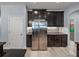 Kitchen area showcasing stainless steel appliances and ample cabinet space at 3939 Sunset Lake Dr, Lakeland, FL 33810