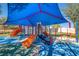 Vibrant playground with slides, climbing walls, and a shade structure for sun protection at 3939 Sunset Lake Dr, Lakeland, FL 33810