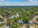 Expansive aerial view of the neighborhood showcasing lush greenery and the property's prime location at 485 E Stanford St, Bartow, FL 33830