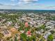 Drone shot locating the property near local businesses and historic architecture, indicated by a red pin at 485 E Stanford St, Bartow, FL 33830