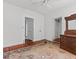 Bedroom with original hard wood floors, an old dresser, and two interior doors at 485 E Stanford St, Bartow, FL 33830