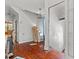 Home entryway displaying hardwood floors and staircase at 485 E Stanford St, Bartow, FL 33830