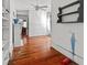 Spacious living area showcasing a fireplace and hardwood floors at 485 E Stanford St, Bartow, FL 33830