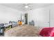 The comfortable bedroom features a neutral color scheme and ample space for storage at 652 N Jackson St, Eagle Lake, FL 33839