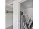 A utility room with water heater, washer hookup, and lots of extra space for storage or projects at 728 Trenton Rd, Lakeland, FL 33815