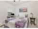 Inviting bedroom setup with a desk, chair, and a flower-themed bed at 3333 Costello Cir, Winter Haven, FL 33884
