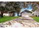 Charming single-Gathering home with a two-car garage and well-maintained lawn at 4526 Ficus Tree Rd, Kissimmee, FL 34758