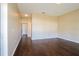 Bright and airy living room with gleaming hardwood floors and natural light at 4526 Ficus Tree Rd, Kissimmee, FL 34758