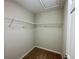 Walk-in closet features sturdy shelving for optimal storage and organization at 6376 Sw 117Th Street Rd, Ocala, FL 34476