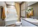 Bathroom featuring a shower/tub combo, modern fixtures, and stylish decorative accents at 774 Ambleside Ave, Haines City, FL 33844