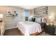 Cozy bedroom with a comfortable bed, stylish decor, and a window view at 774 Ambleside Ave, Haines City, FL 33844