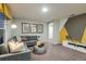Cozy living room featuring comfortable seating, modern decor, and ample natural light at 774 Ambleside Ave, Haines City, FL 33844