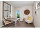 Cozy home office featuring a comfortable chair and a window with natural light at 774 Ambleside Ave, Haines City, FL 33844