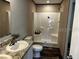 Clean and modern bathroom with a stand-up shower and plenty of natural light at 9494 Se 144Th Pl, Summerfield, FL 34491