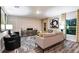 Modern living room featuring a patterned rug, stylish furniture, and lots of natural light at 1609 Sage Ave, Haines City, FL 33844