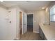 Bathroom features a single shower, vanity and an entry to the powder room at 1617 Sage Ave, Haines City, FL 33844