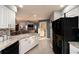 Open kitchen with granite countertops flowing into an inviting living space at 3610 Amber Ln, Lakeland, FL 33812